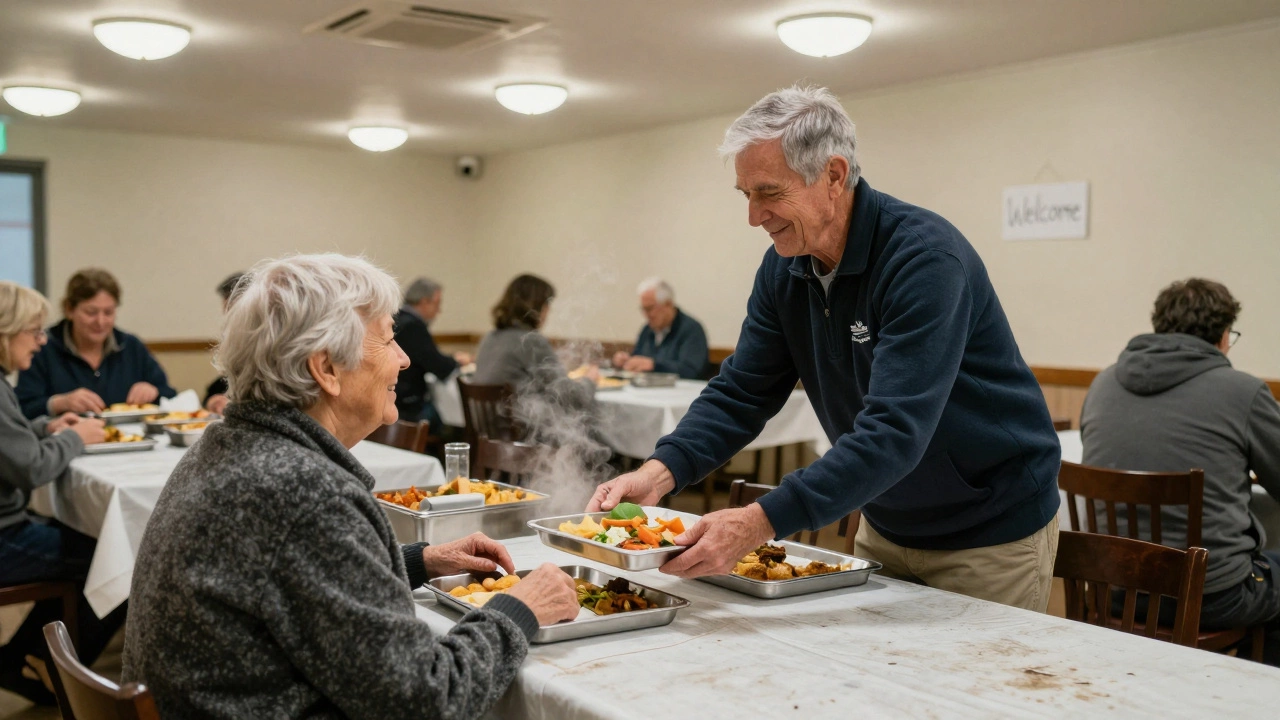 An elderly volunteer serving a meal to a senior in a community dining hall.